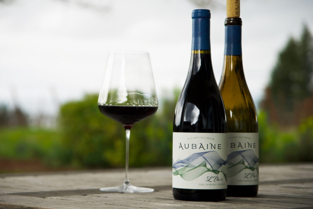 Windfall L'Élu Pinot Noir and Chardonnay on the outdoor table at ATJ